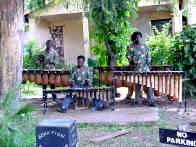 We saw these people performing outside the arts and crafts market.