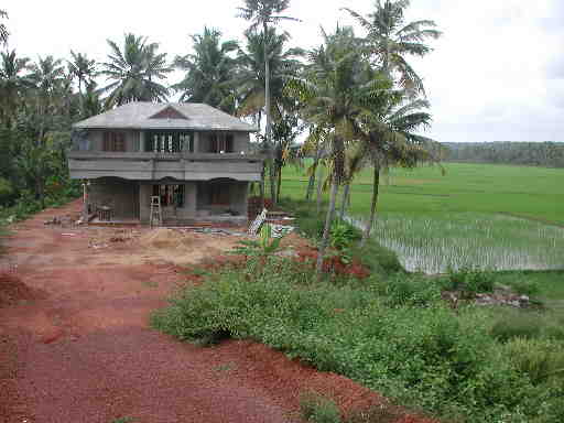 DSCN7499 House next to the Paddy field