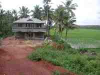 DSCN7499 House next to the Paddy field